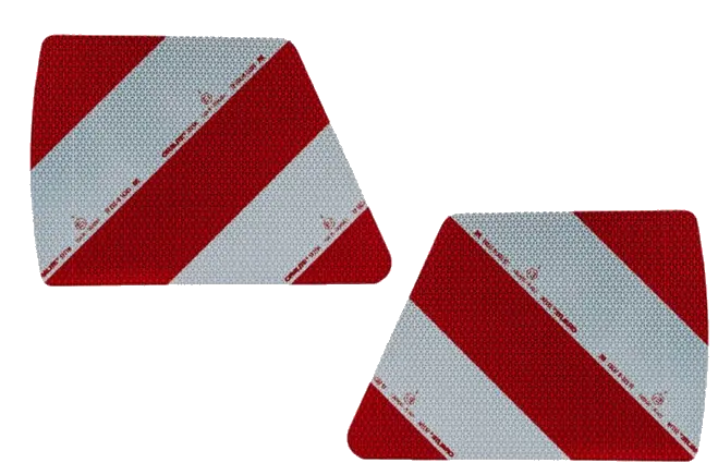Pair of reflective red and white diagonal stripe warning stickers with cut corners on a transparent background