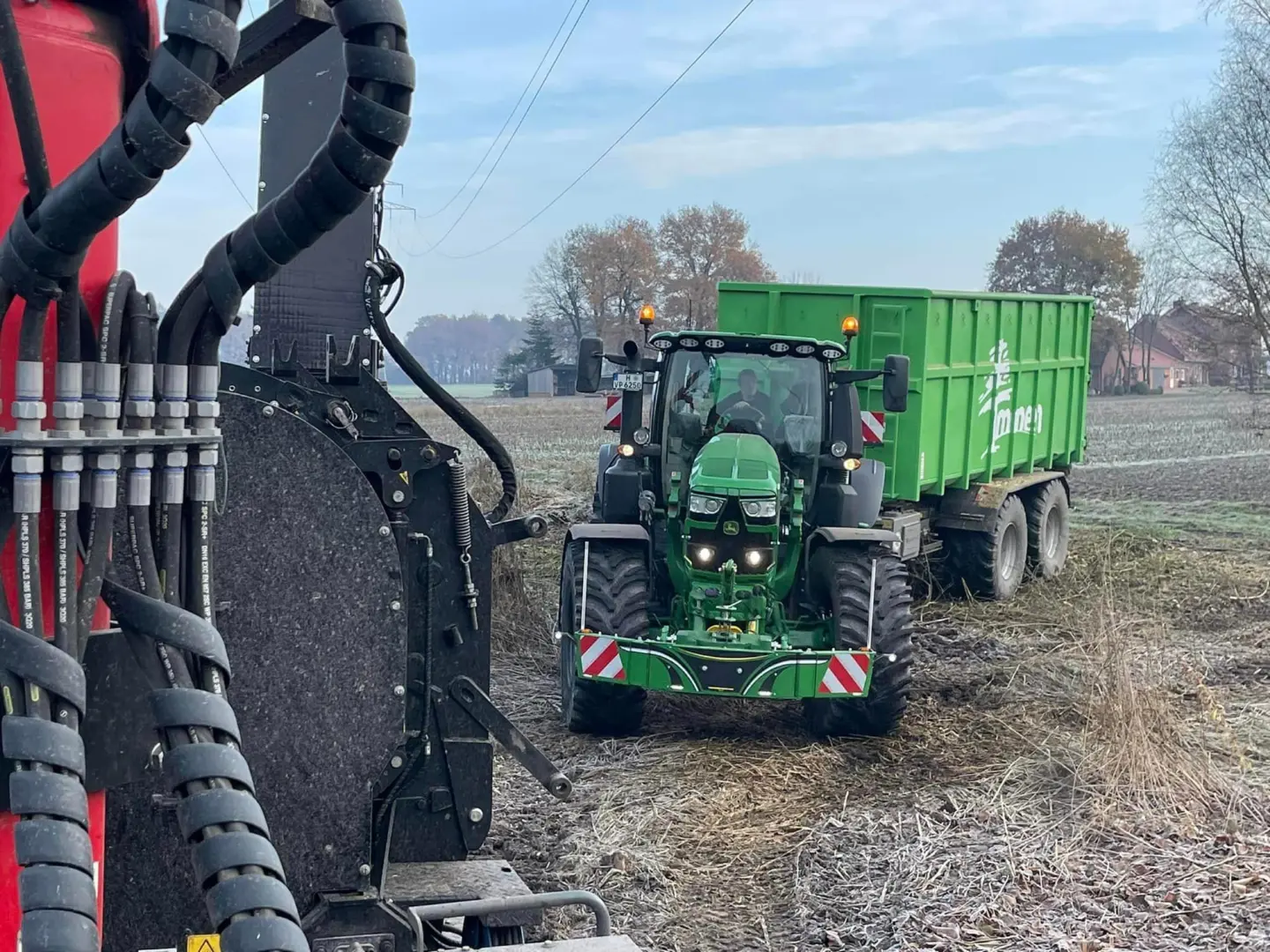 John Deere tractor with a TractorBumper front bumper and rear weight