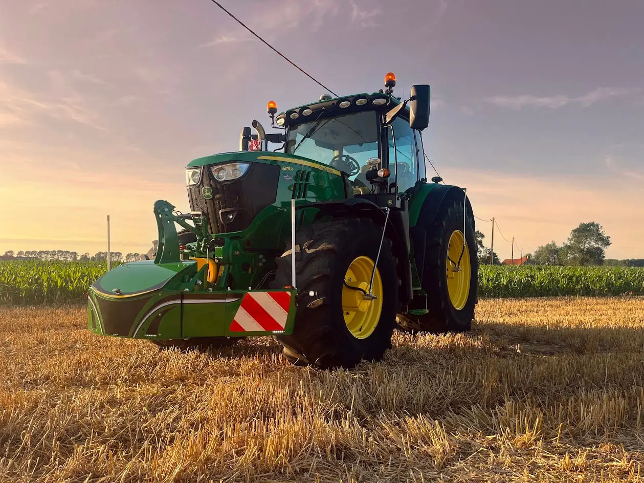 John Deere tractor with a TractorBumper front bumper and rear weight