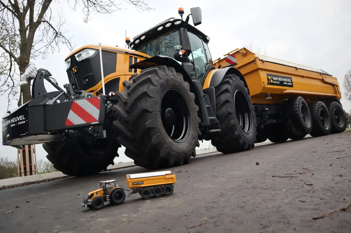 John Deere tractor with a TractorBumper front bumper and rear weight