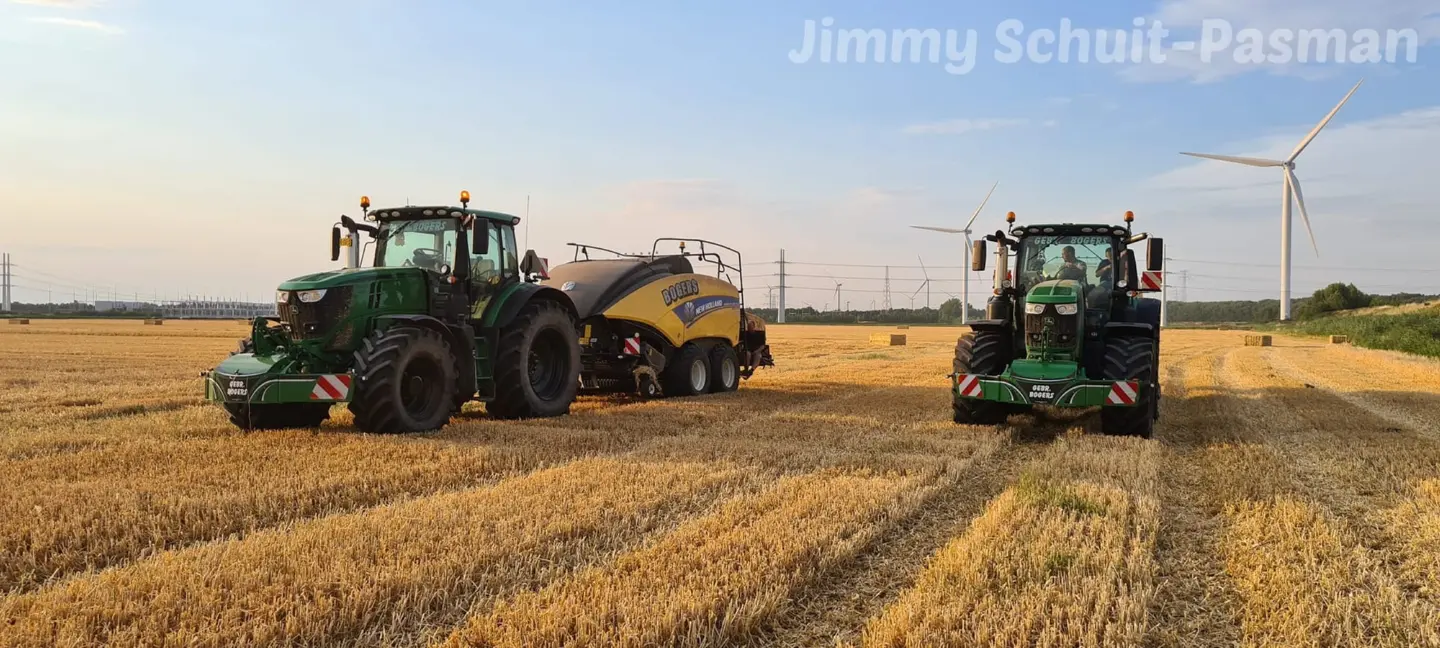 John Deere tractor with a TractorBumper front bumper and rear weight